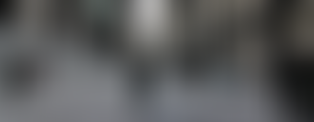 © Credit to photography Didier Leroi, visitors in the tate modern walking on a vast grey space of sunflower seeds