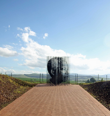 Poles unify together to form Nelson Mandela's face.