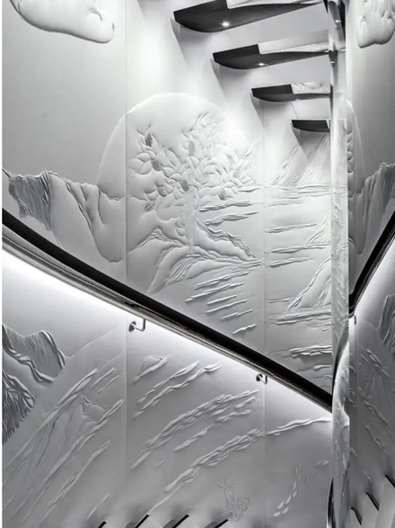 Interior of a private superyacht with spiral staircase featuring a large scale mural of padded, quilted cotton floral motifs in cream. M/Y Lusine (60m), Heesen Yachts. Curated, commissioned & installed by Artelier Art Consultancy © Photography by David Churchill