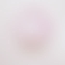 Mariko Mori's Genesis IV (2022) showcasing a circular wall structure piece of art in light pinks depicted in an galactic, space like style