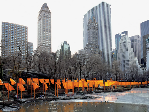 Christo and Jeanne Claude The Gates, a public artwork that dominated central park, set against the new york city skyscrapers.